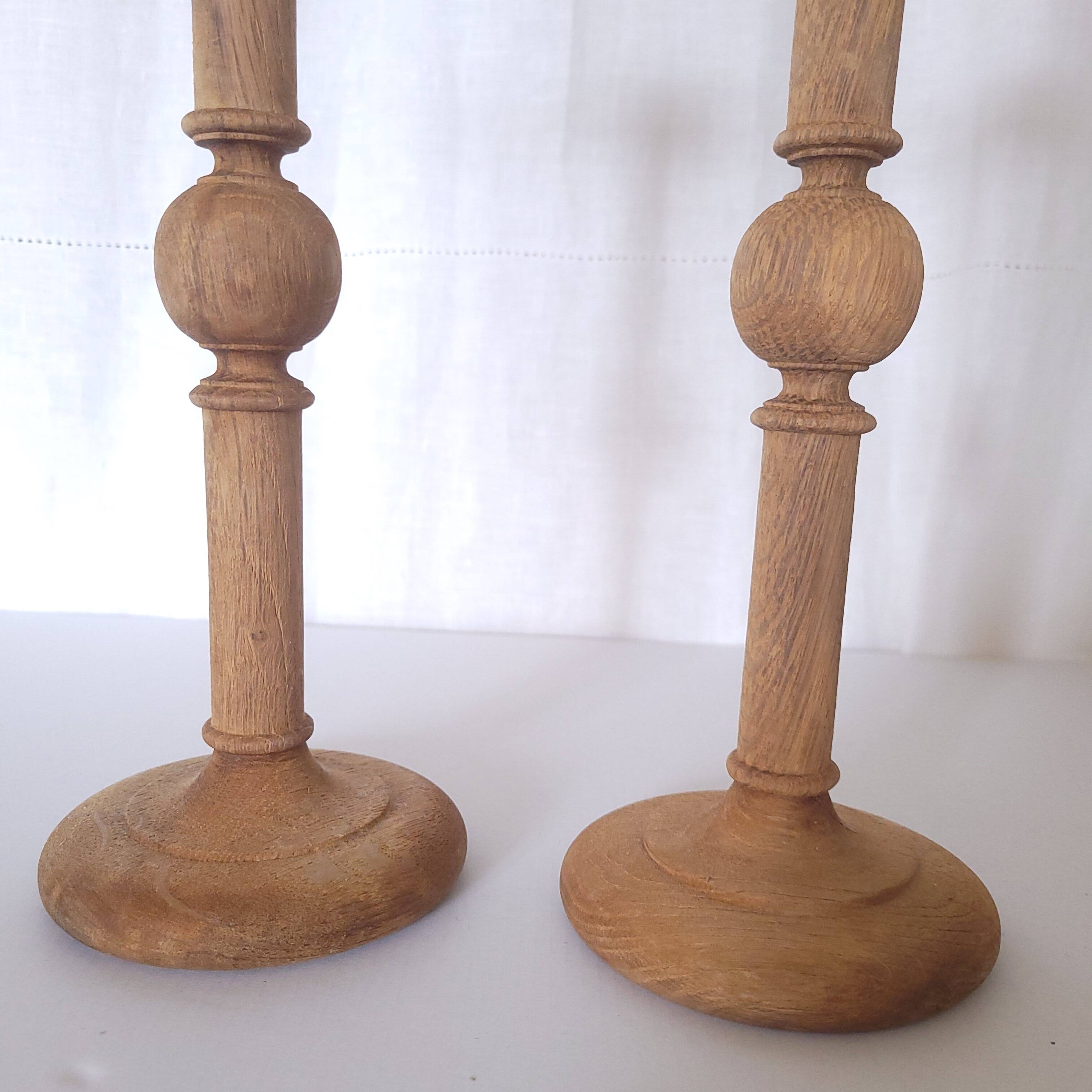 Large carved wooden candlesticks