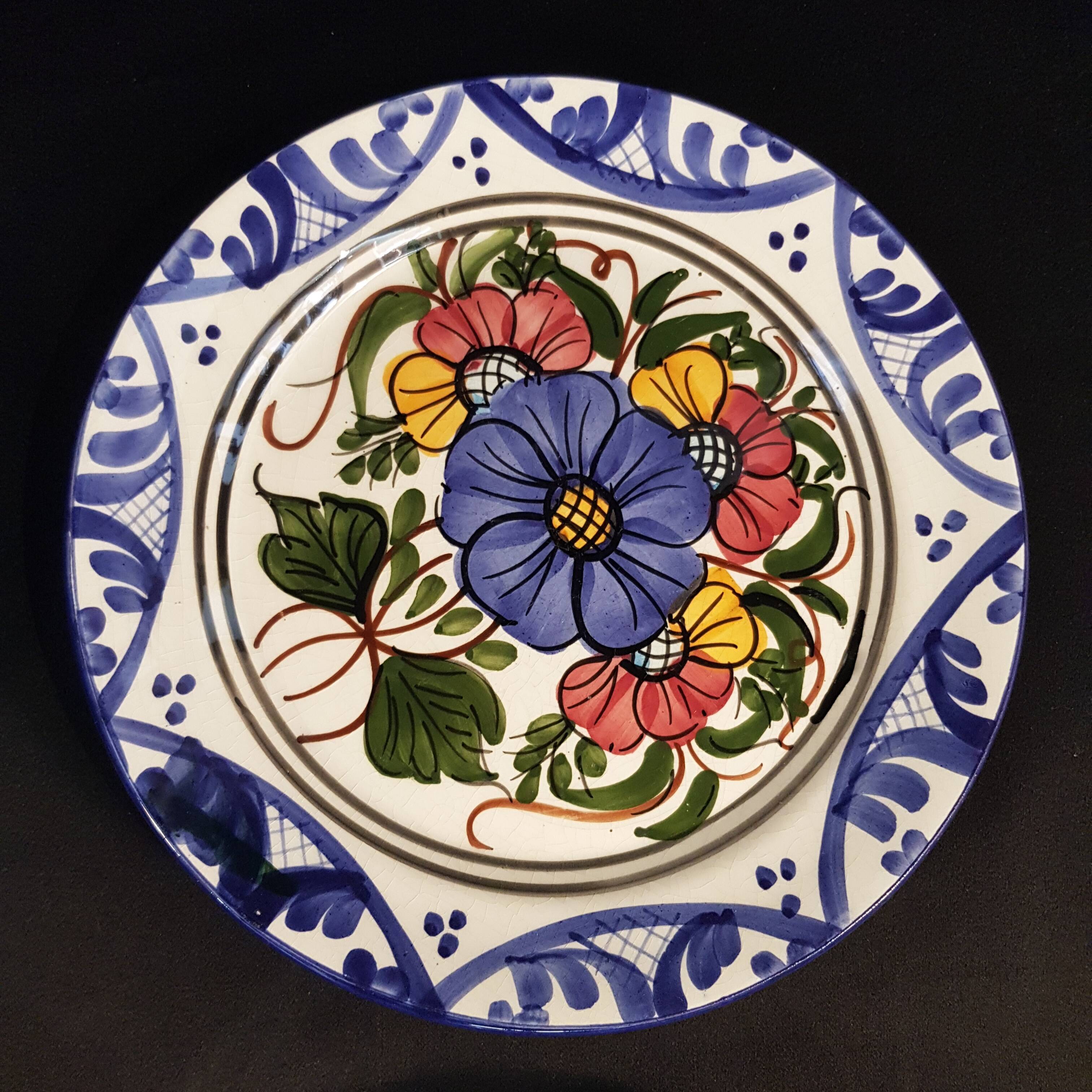 4 decorative earthenware plates