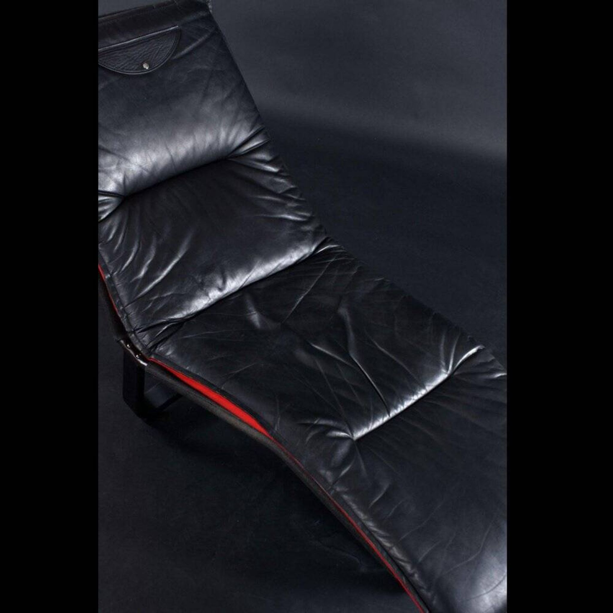 Scandinavian modern black leather and red wool reversible chaise lounge from Westnofa, Norwegian