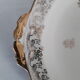 Porcelain dish decorated with golden flowers