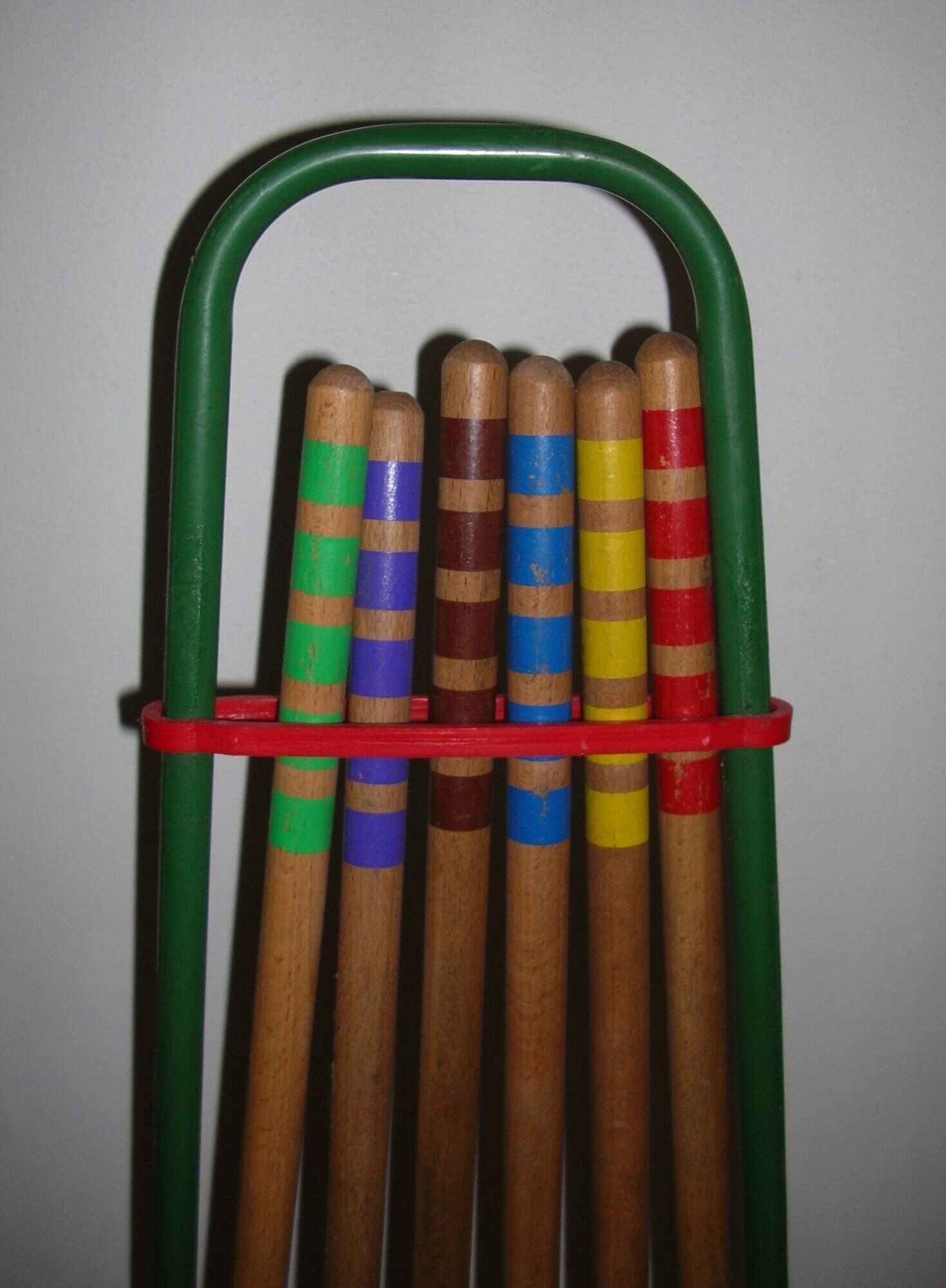 Wooden garden croquet game in its metal cart
