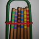 Wooden garden croquet game in its metal cart