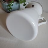 White enamelled metal jug