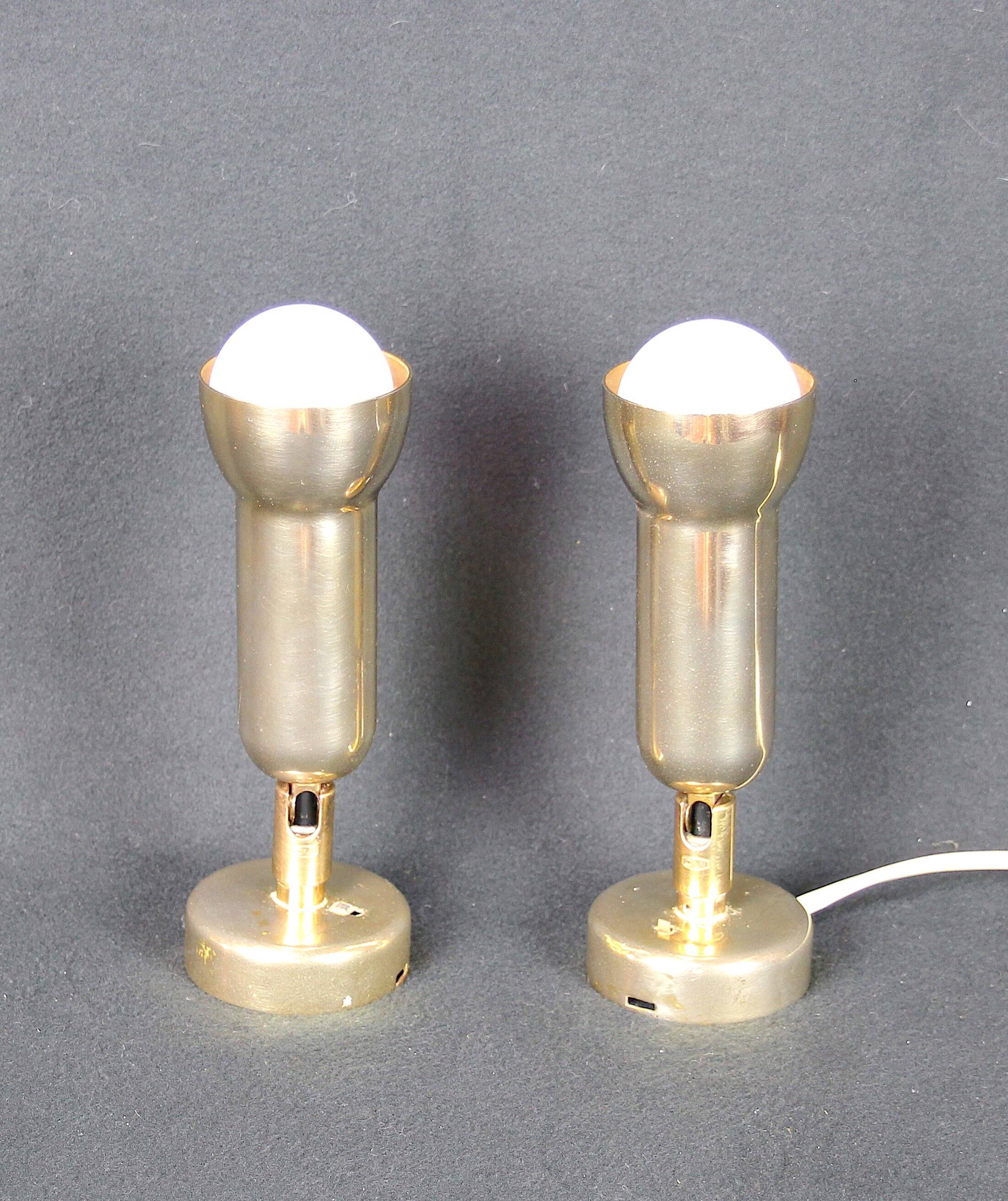 Pair of golden brass spot lights, by Koch & Lowy OMI