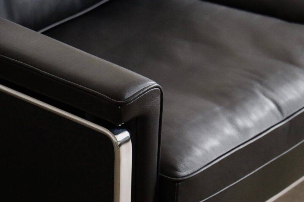 Horst Brüning Model 6912 two seater sofa in black leather for Kill International, Germany 1967