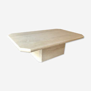 Light-colored travertine coffee table