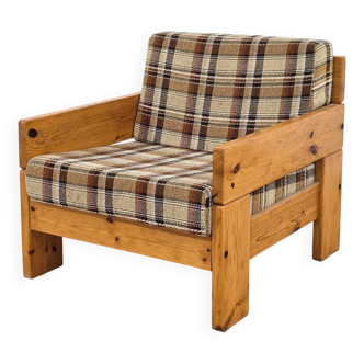 Solid wood designer armchair from the 1970s