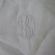 Tablecloth and its twelve monogrammed towels.