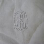 Tablecloth and its twelve monogrammed towels.