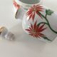 Y. Ginther porcelain jar and toilet jar
