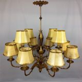Golden luster with 12 arms of light decorated with leaves 1940