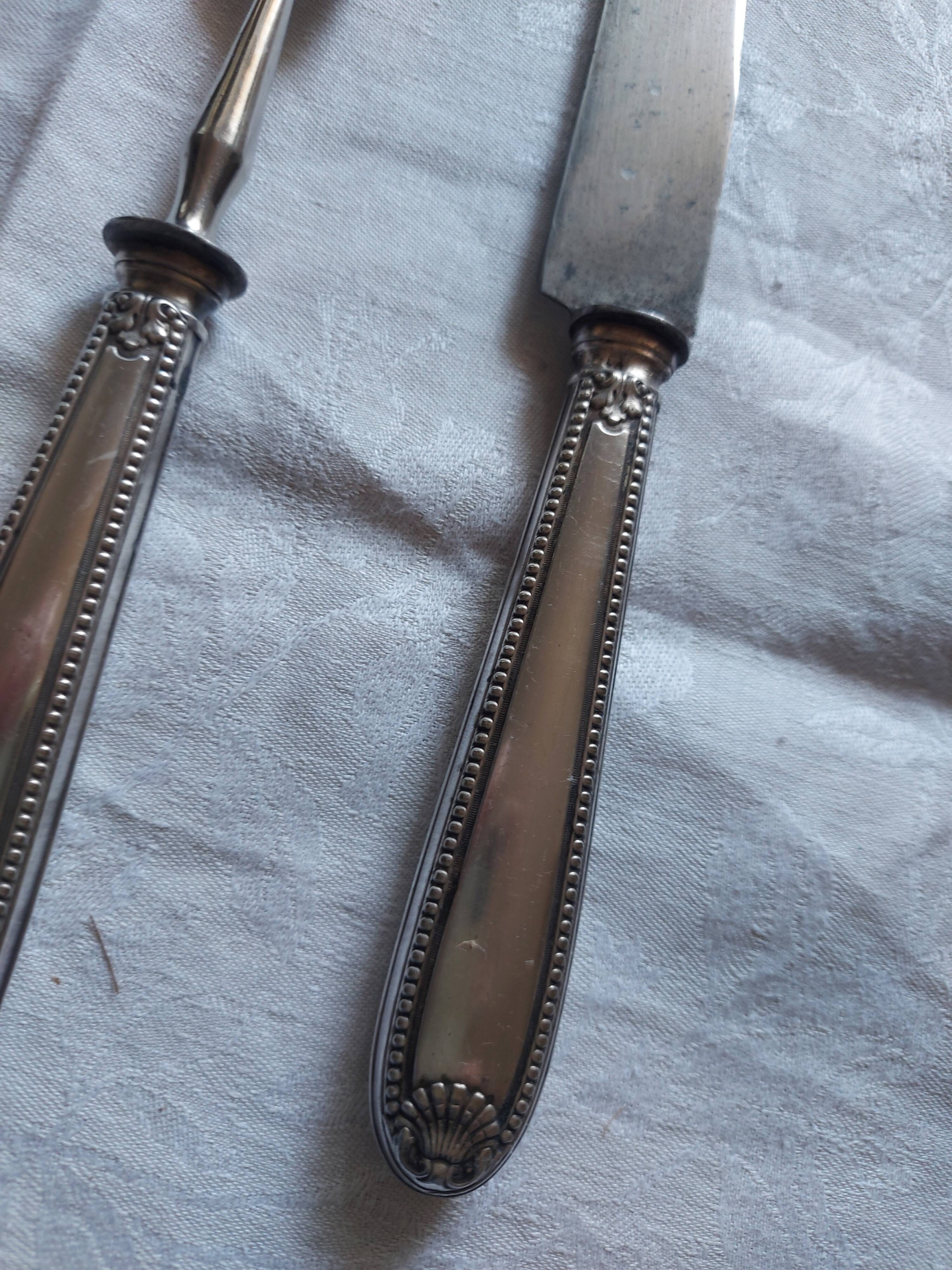 Serving, silvered metal leg cutlery