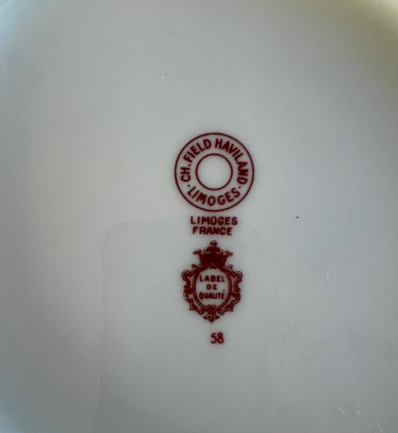 8 Haviland Limoges dinner plates.