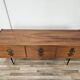 1960s walnut chest of drawers with iron and brass details
