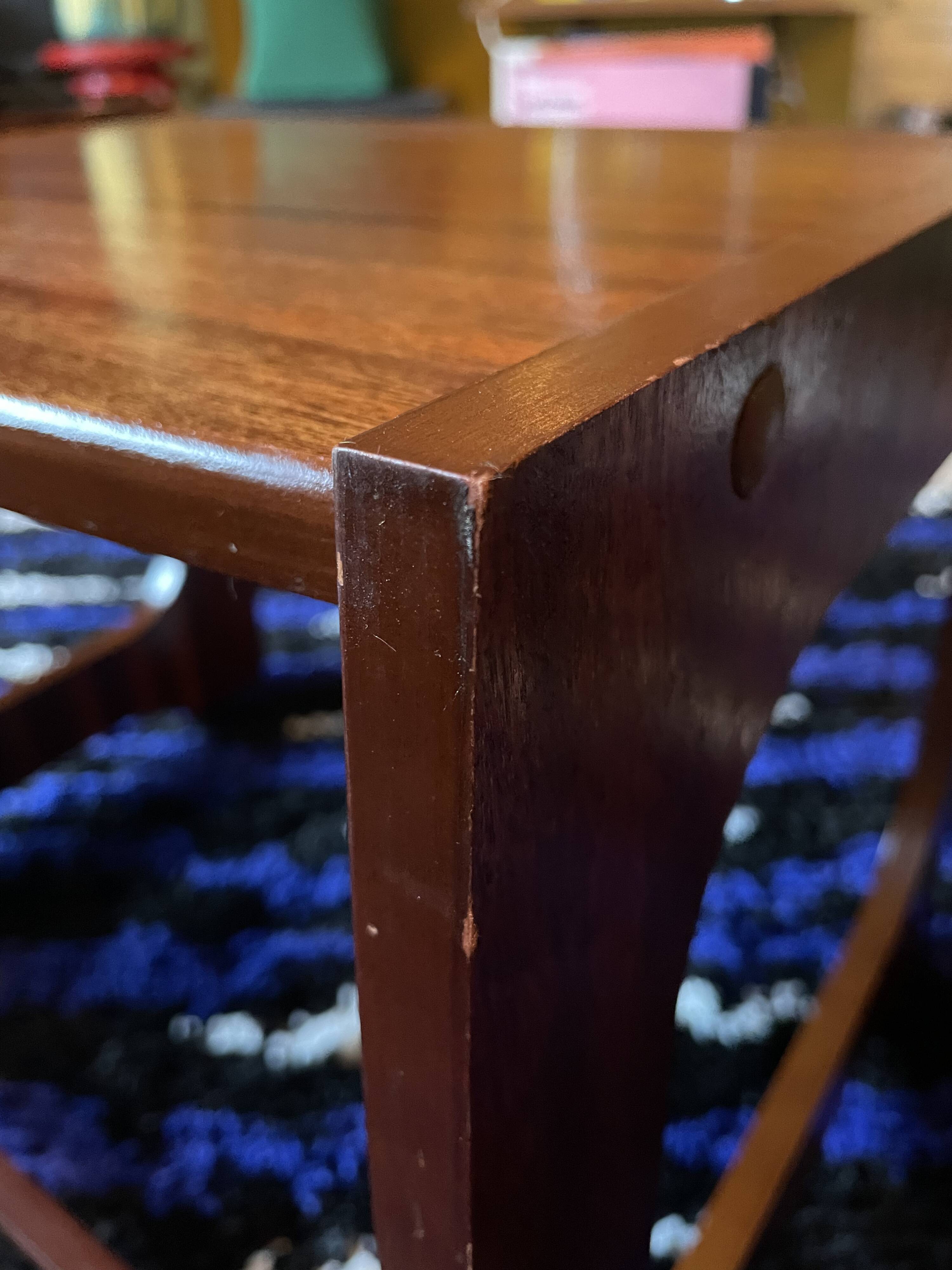 Set of three nesting coffee tables, 1970, dark wood.