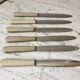 set of 6 white bakelite knives from the 60s