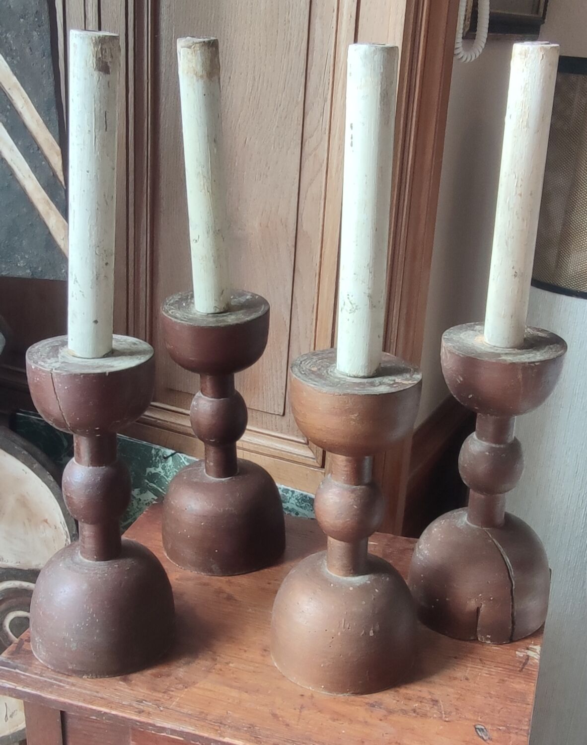 Series of 4 old large wooden candlesticks/brutalist