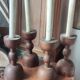 Series of 4 old large wooden candlesticks/brutalist