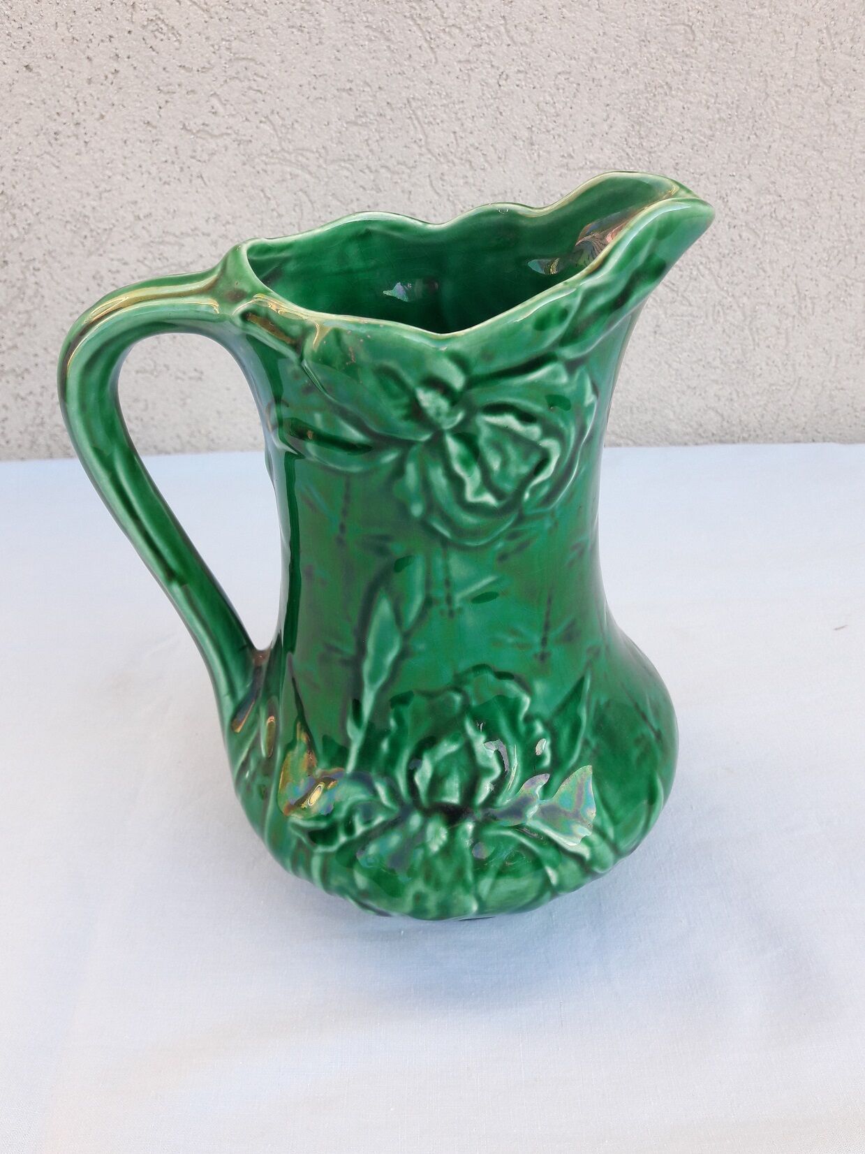 Green ceramic pitcher