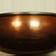 Copper cauldron with golden bronze bull heads