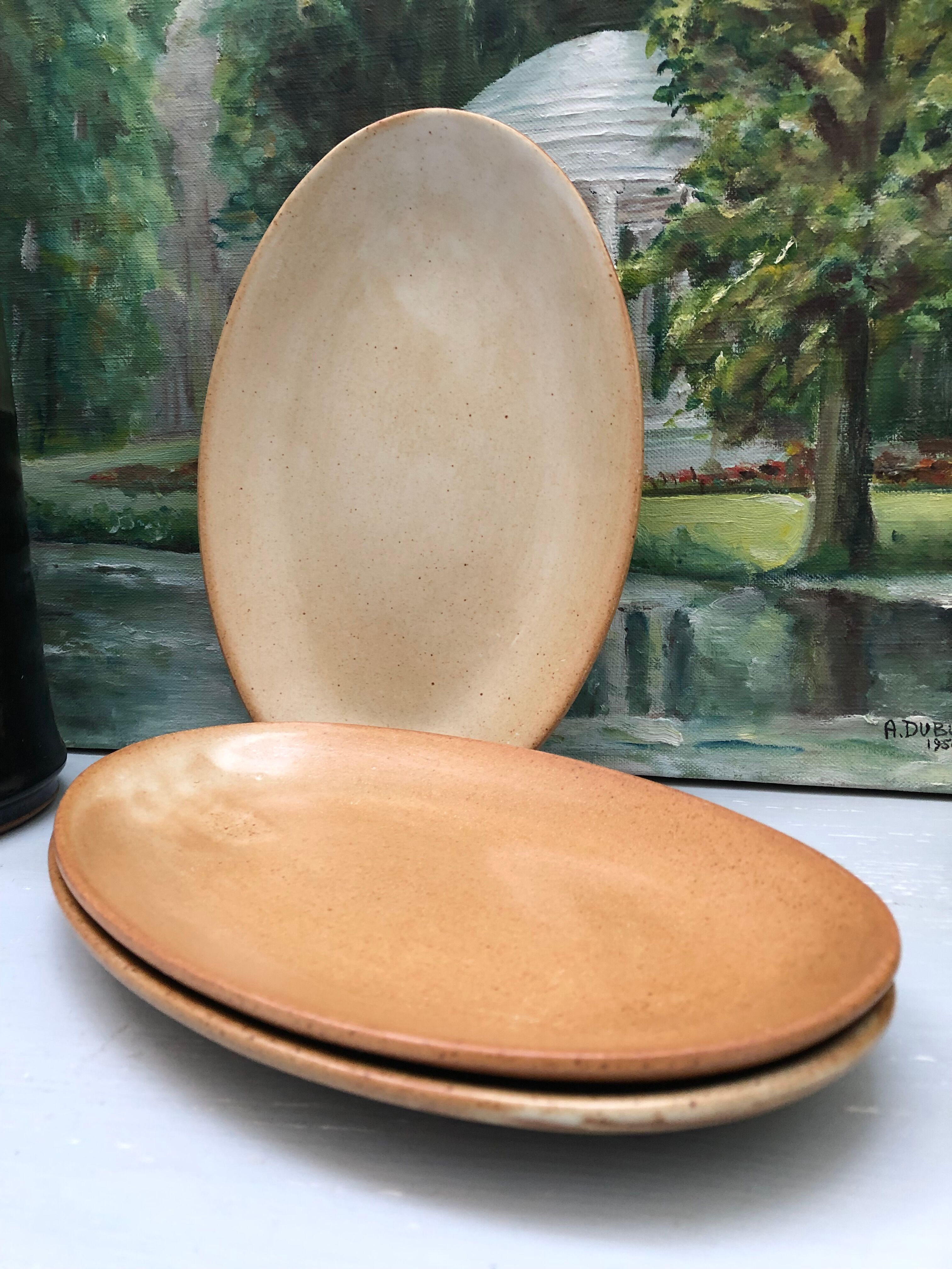 Set of three stoneware dishes village france
