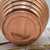 Old copper pot cover