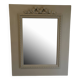 Wooden mirror with patinated beige knot