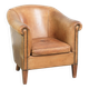 Fauteuil club en peau de mouton confortable de couleur cognac.