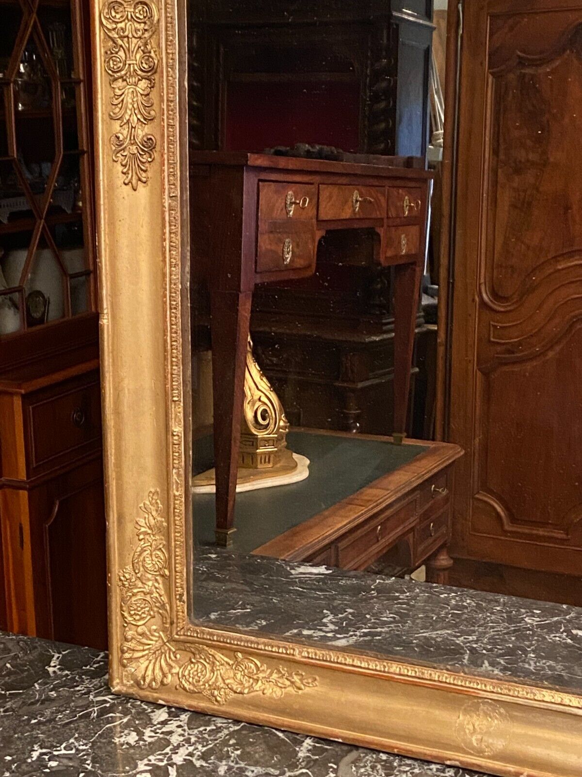 Large mirror fireplace mirror in wood and gilded stucco XIX Restoration