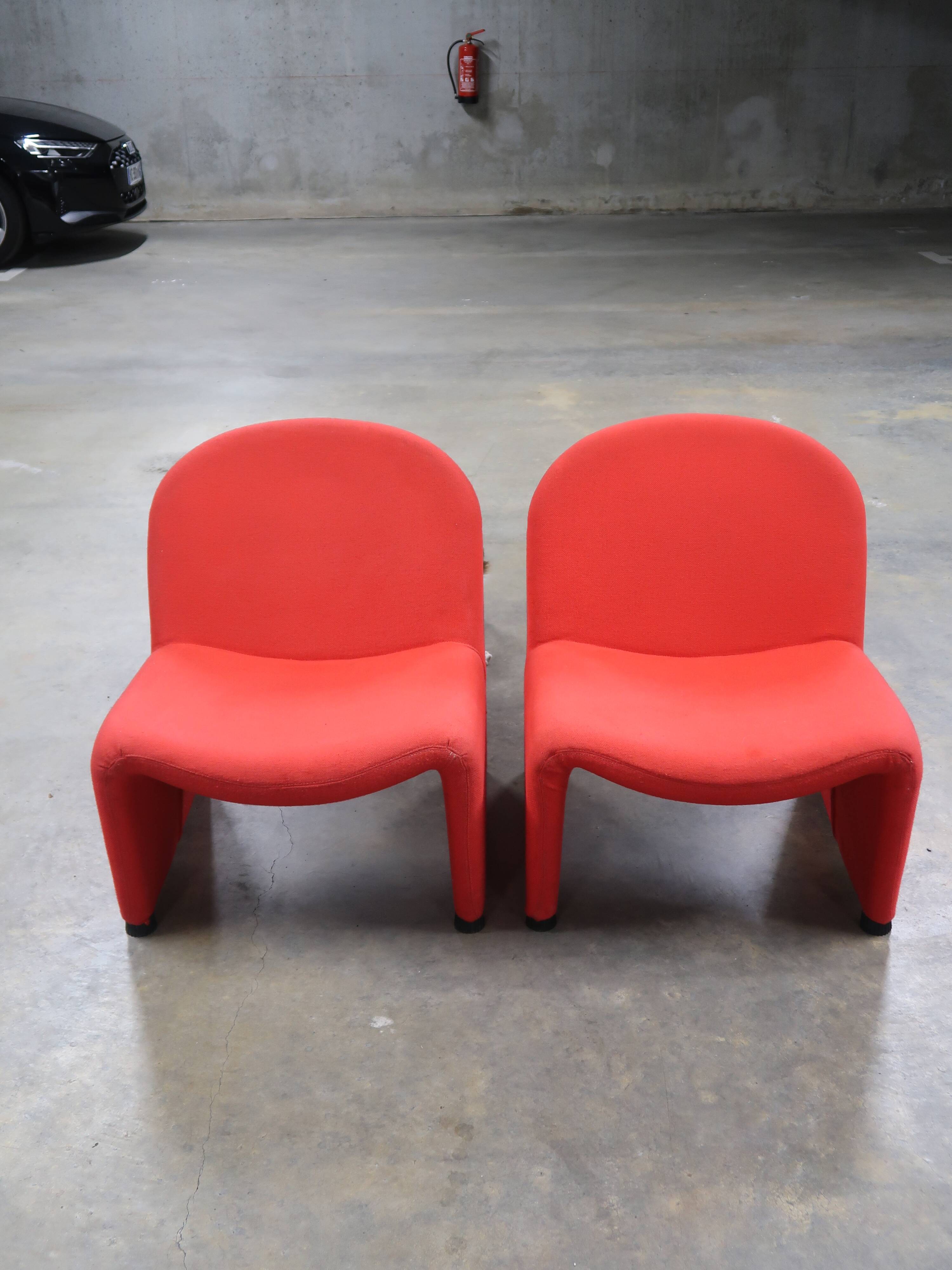 Pair of vintage red armchairs