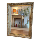 Gilded mirror with antique wood and stucco frame