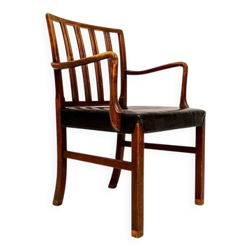 Mid-century armchair by Ole Wanscher for Fritz Hansen, stained beech and leather.