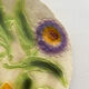 Assiette ancienne en barbotine 3 fleurs