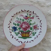 Old St Clément earthenware plate, flat plate with flower patterns.