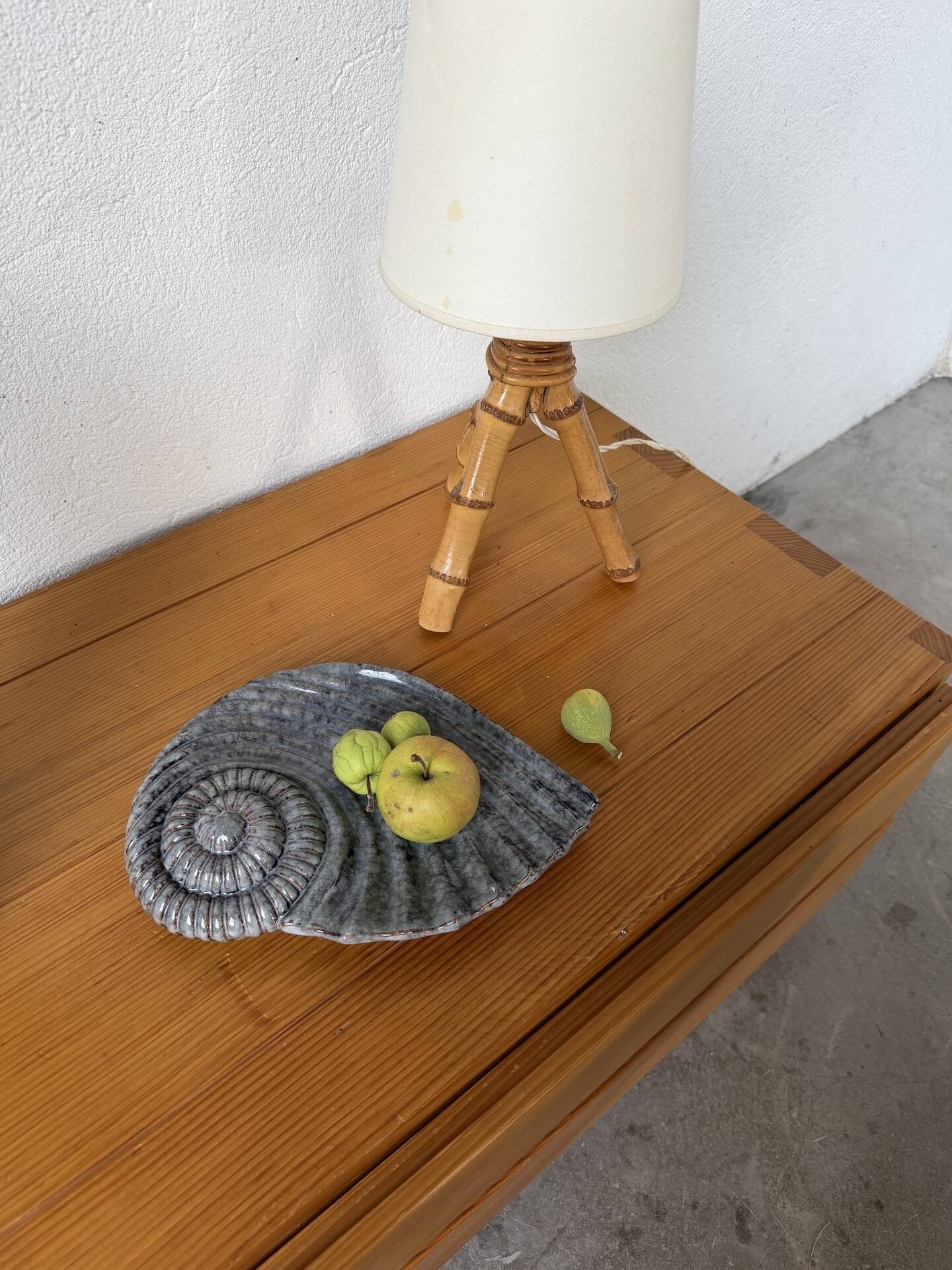 Shell-shaped ceramic catchall.