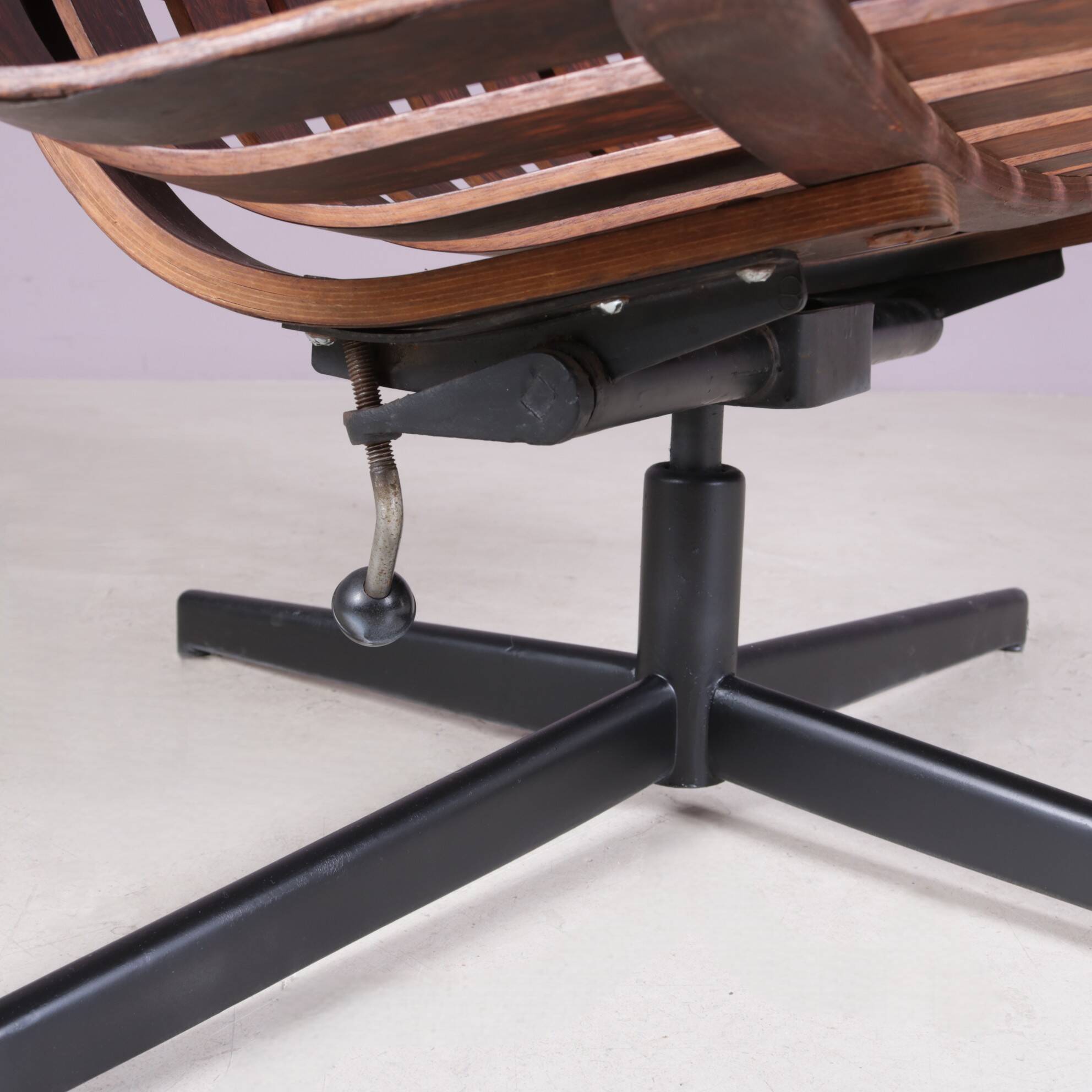 Lounge chair Rosewood with black metal cross base Hans Brattrud 1960s