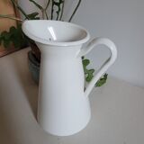 White enamelled metal jug