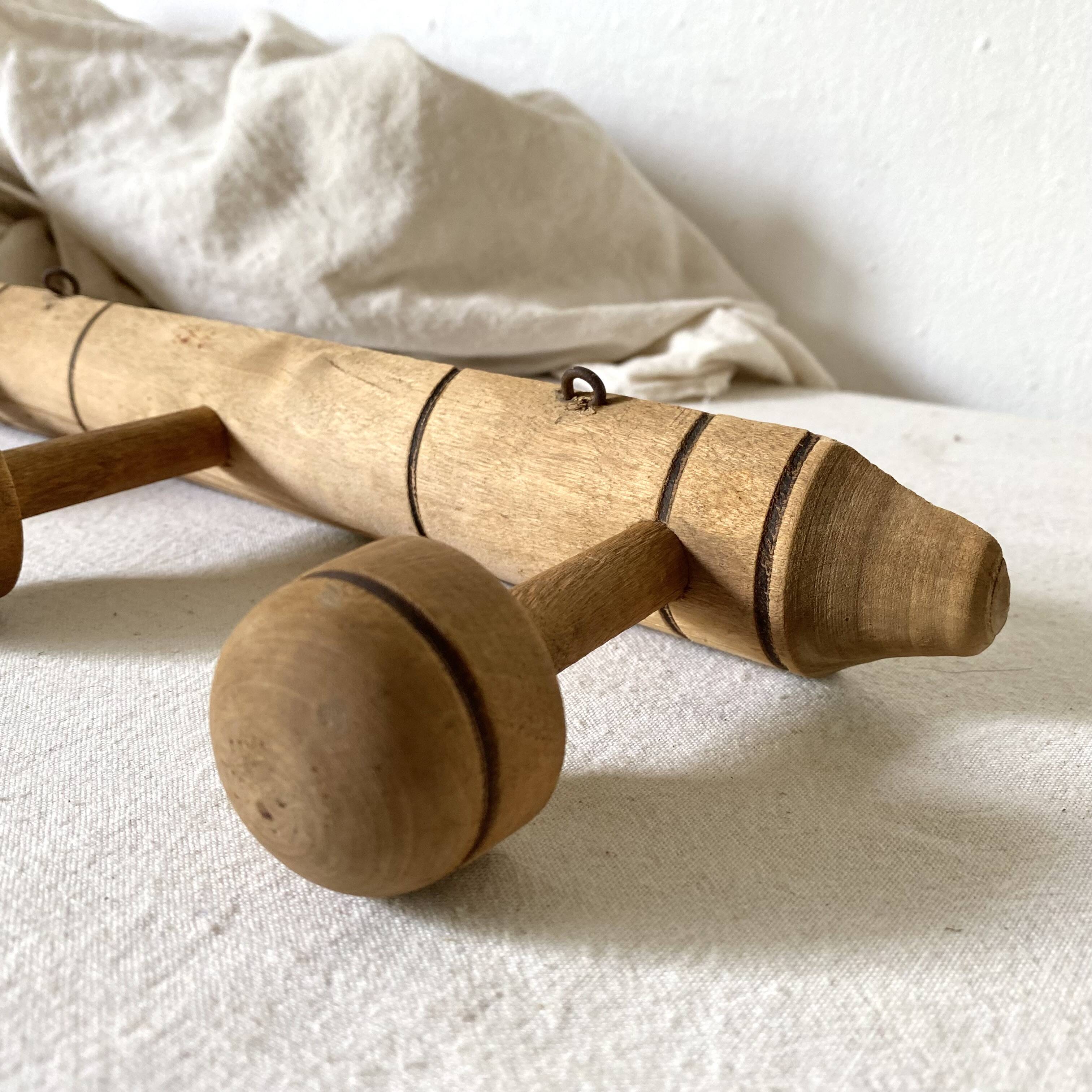 Turned wooden wall coat rack with 3 hooks