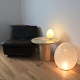 Round travertine coffee table