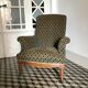 Vintage armchairs and rests feet