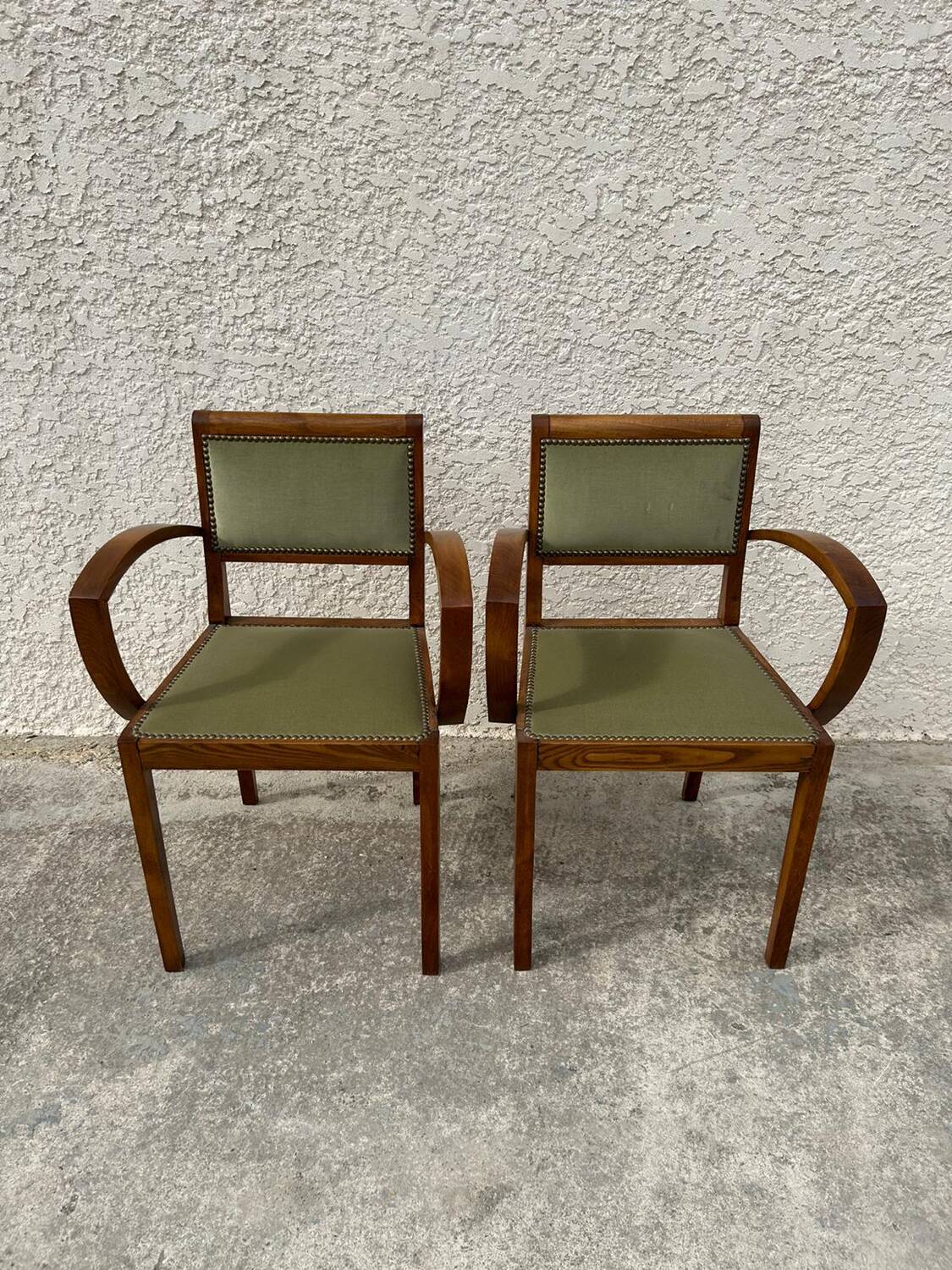Pair of green velvet bridge armchairs