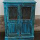 Old wooden cabinet with doors with grille