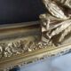 Large antique mirror in wood and gilded stucco.