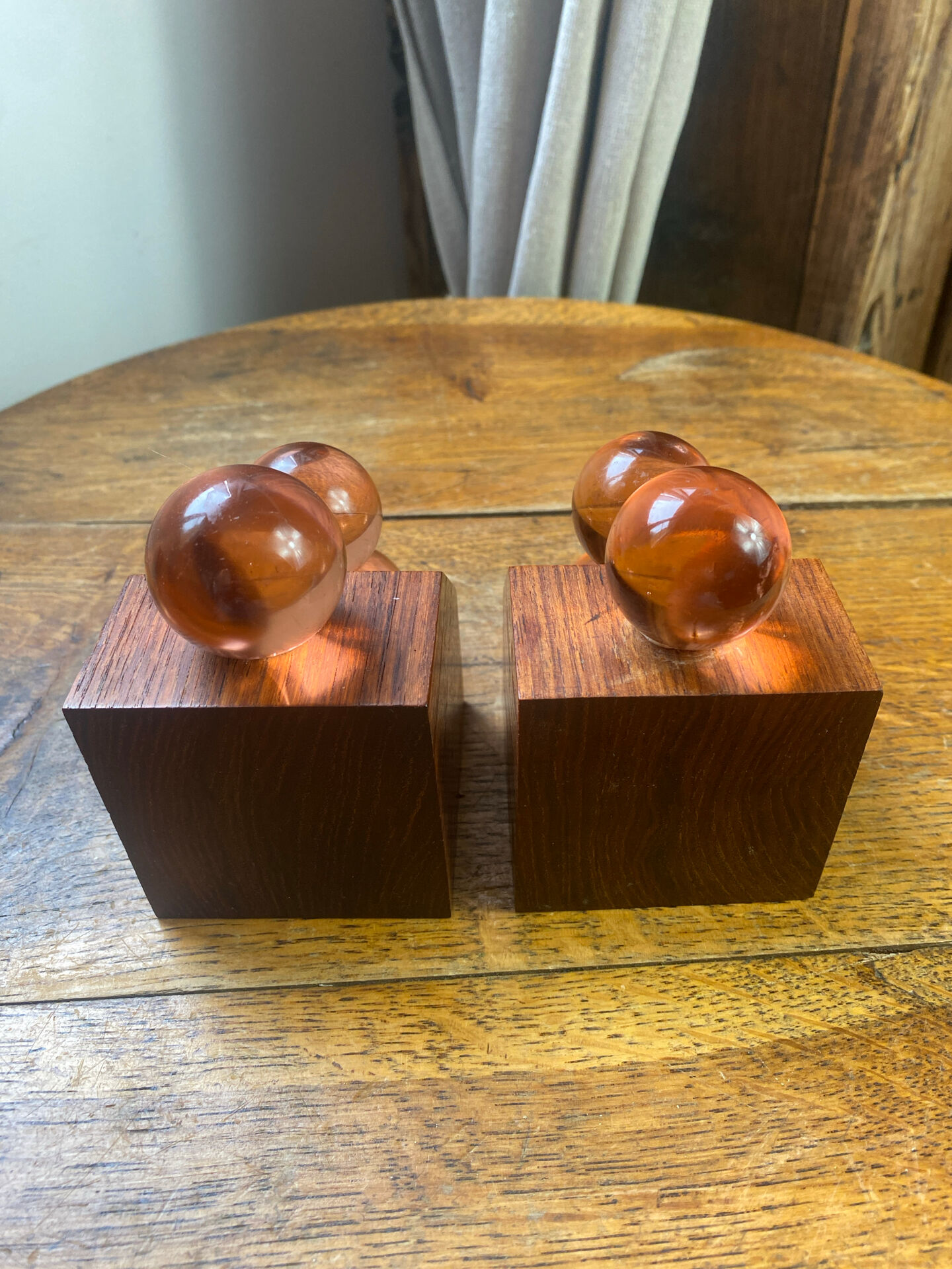 Wooden bookends and spherical glass balls