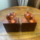 Wooden bookends and spherical glass balls