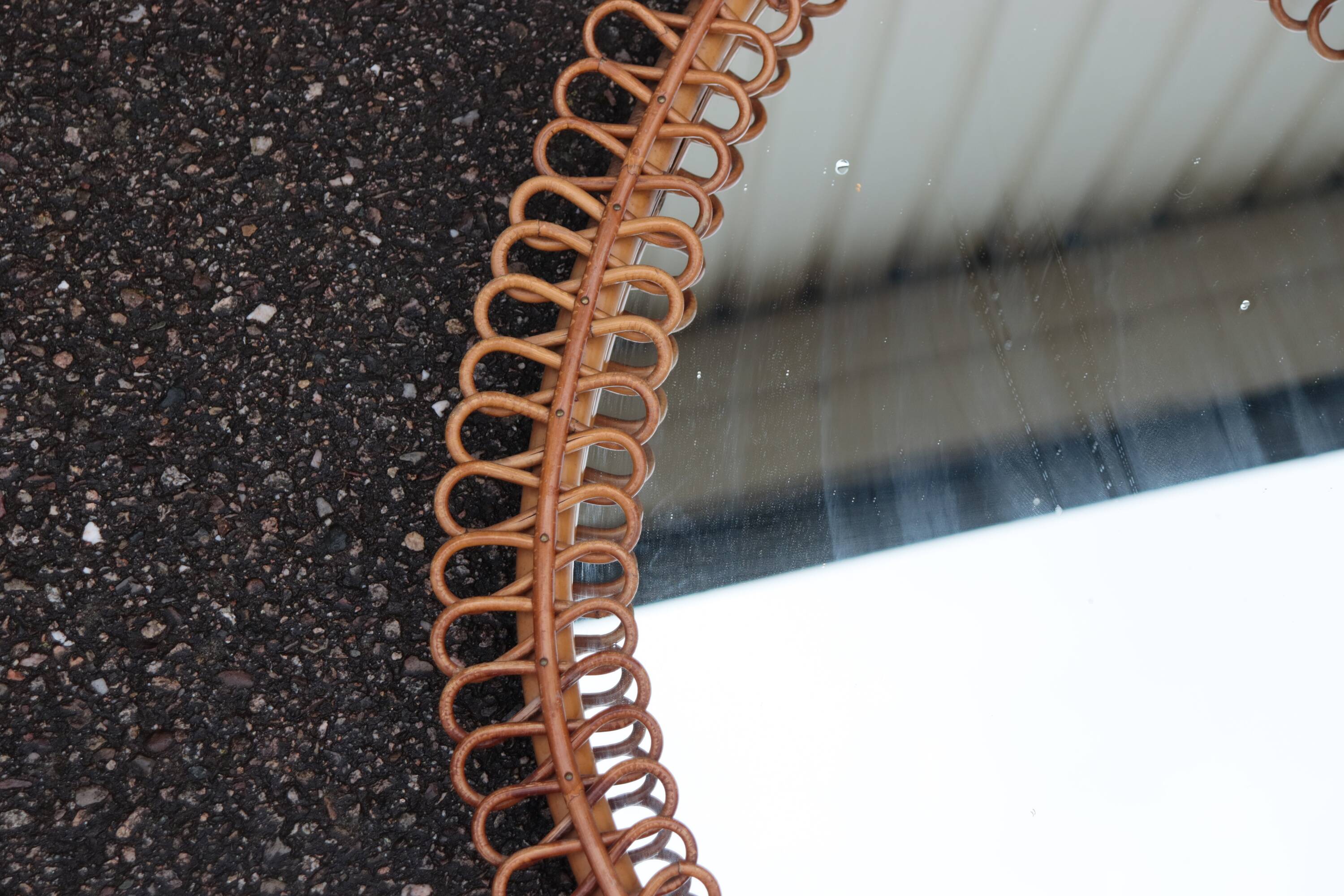 Large rattan mirror attributed to Franco Albini, Italy 1960.