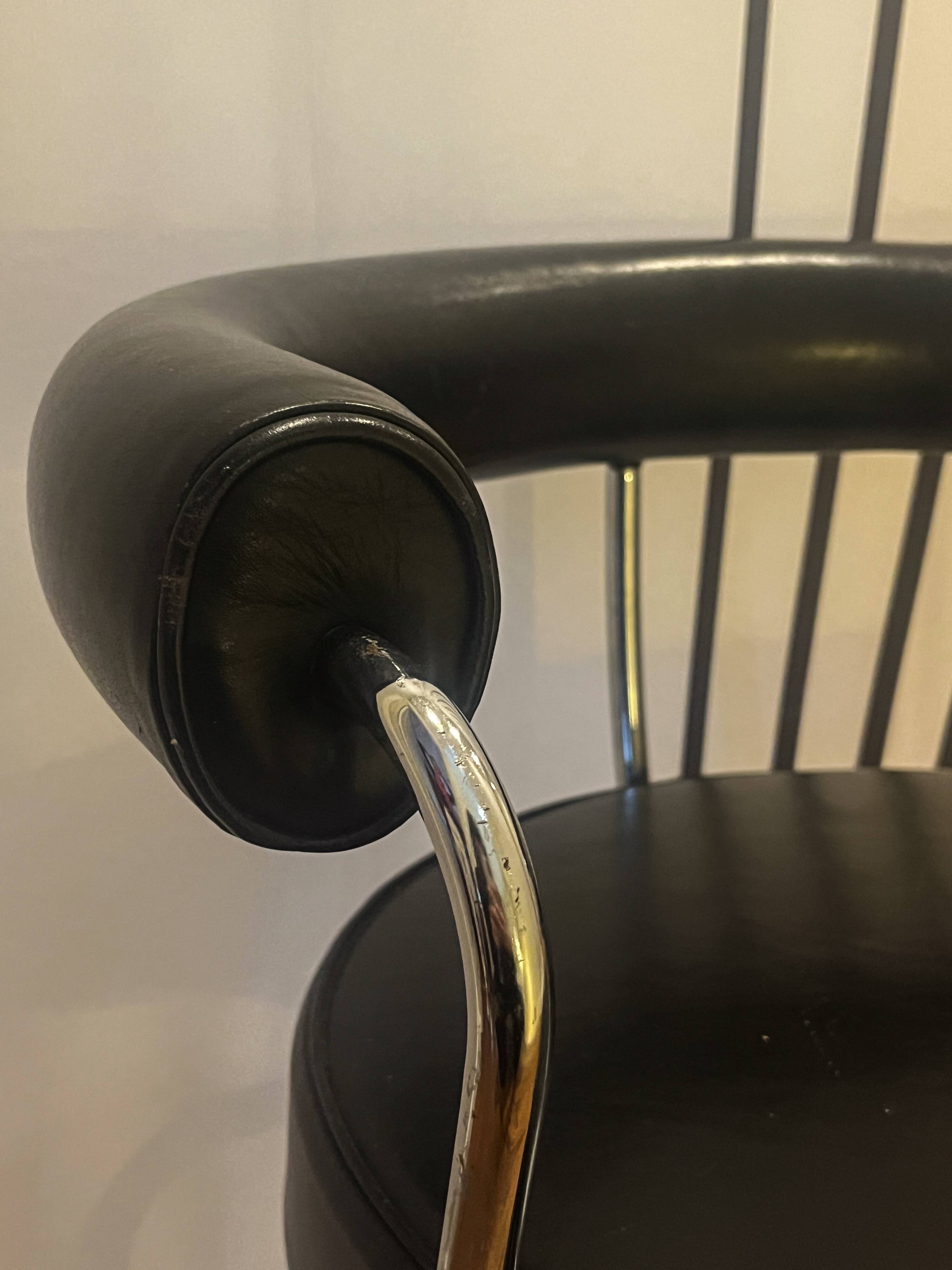 La Corbusier, Pair of LC7 armchairs, Cassina edition