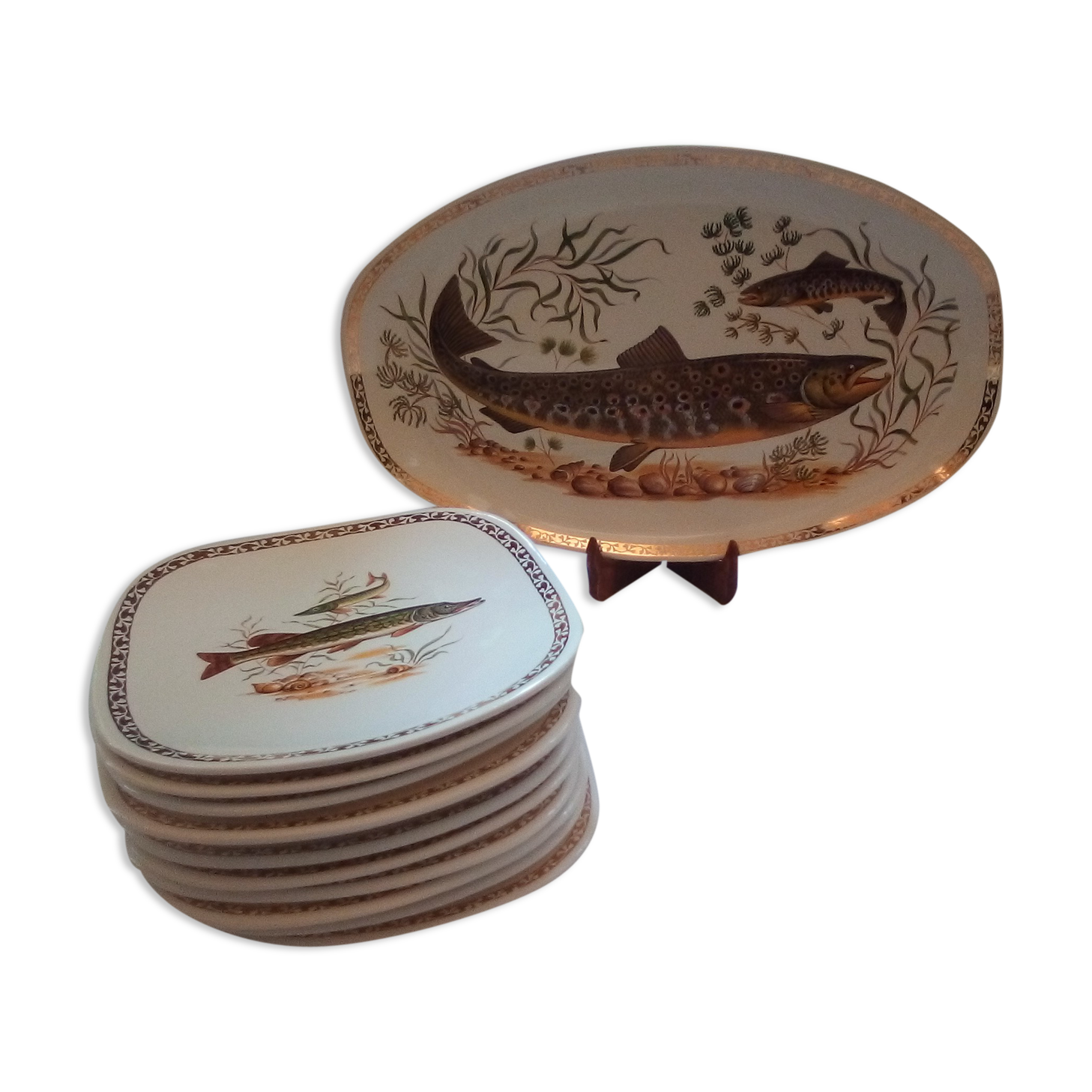 Set of 12 Longchamp plates and fish dish