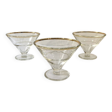 Trio of glass dessert bowls with gold rims, La Rochère, France