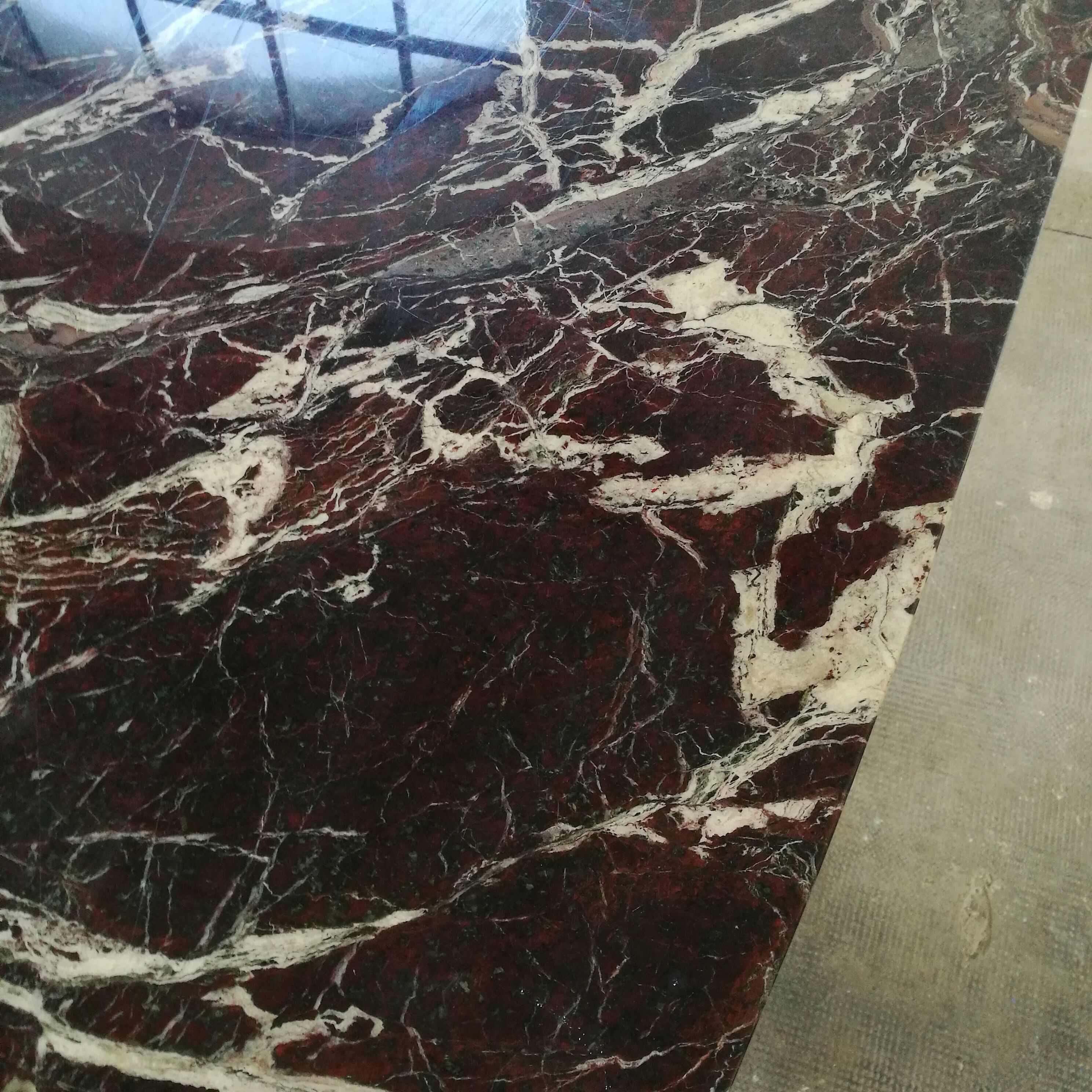 Table, chrome foot, red marble